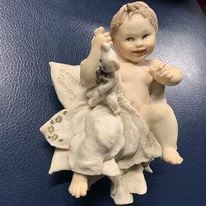 Porcelain Figurine of Baby with Teddy Bear